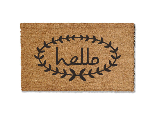 Welcome guests with our coir doormat adorned with a 'Hello' greeting surrounded by a leaf border. Available in multiple sizes, this versatile mat is perfect for year-round use, adding a touch of elegance to your entryway. Not only does it elevate your home's entrance, but it also effectively stops dirt from entering your space.