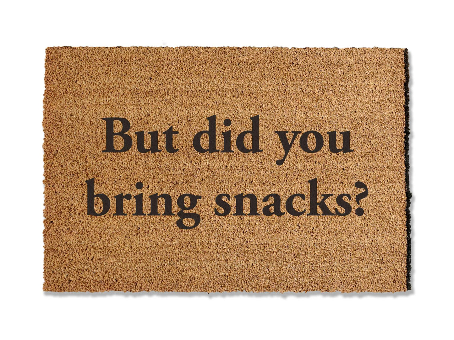 1/2-inch thick coir doormat featuring a witty phrase 'But did you bring snacks?' This humorous and functional mat not only adds personality to your entryway but is also highly effective at trapping dirt, making it a delightful and practical addition to your home.