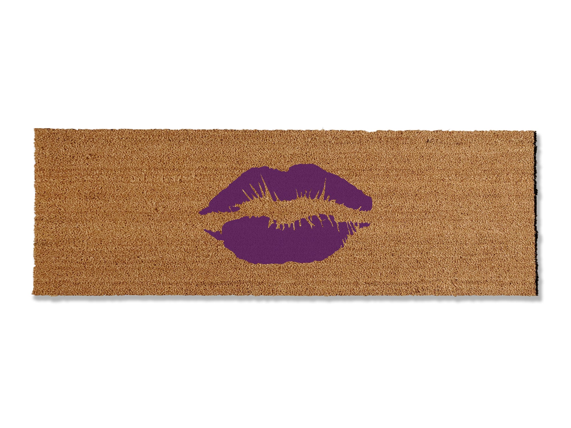 Make a chic statement with our coir doormat featuring a playful lipstick smooch. Available in multiple colors and sizes, this trendy mat adds a touch of glamour to your doorstep. Beyond style, it excels at trapping dirt, making it a functional and fashionable addition to your entryway.