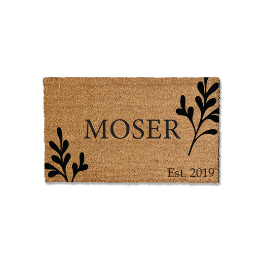 Discover our custom coir doormat, offered in various sizes. Add a personal touch to your entryway by customizing with your last name and your established date. These coir doormats excel at trapping dirt, ensuring a cleaner home. Choose the perfect size to complete your entryway with style and functionality.