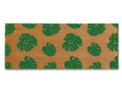 Transform your entrance with our coir doormat showcasing an all-over monstera leaf pattern. The perfect touch for a beach or tropical vibe, this stylish mat is available in multiple sizes and colors. Beyond its aesthetic appeal, it excels at trapping dirt, making it a functional and fashionable addition to enhance your entryway.