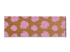 Transform your entrance with our coir doormat showcasing an all-over monstera leaf pattern. The perfect touch for a beach or tropical vibe, this stylish mat is available in multiple sizes and colors. Beyond its aesthetic appeal, it excels at trapping dirt, making it a functional and fashionable addition to enhance your entryway.