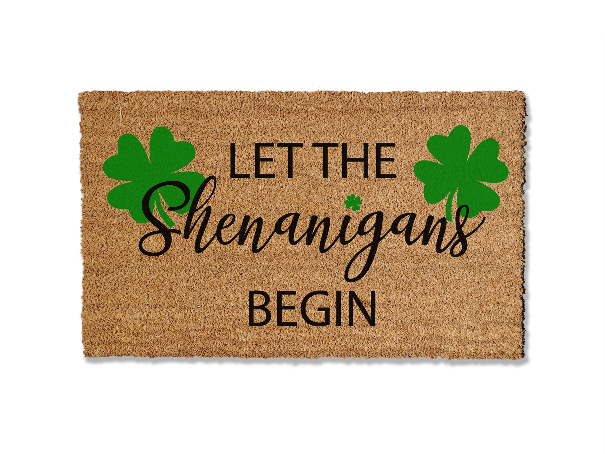 Add a touch of Irish charm to your entryway with our seasonal coir doormat featuring four-leaf clovers and the playful phrase 'Let the Shenanigans Begin.' Perfect for St. Patrick's Day, this festive design brings a whimsical flair to your doorstep. Available in multiple sizes, the mat is not only delightful but also effective at trapping dirt.
