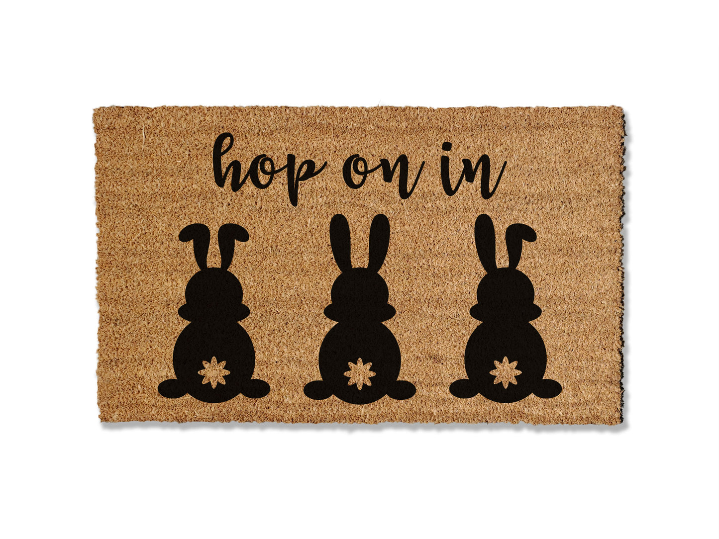 Welcome guests with our festive seasonal coir doormat, saying 'Hop on In' and featuring three adorable bunnies. The perfect way to greet guests this Easter, this mat not only adds a touch of holiday cheer but also excels at trapping dirt to keep it from entering your home.