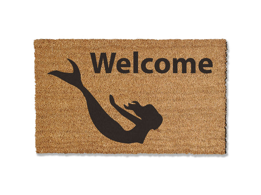 Welcome guests with a touch of enchantment using our mermaid-themed coir doormat. Let this mythical sea creature invite people into your home with its whimsical charm. Available in multiple sizes, this mat not only adds a magical touch to your doorstep but also excels at trapping dirt.