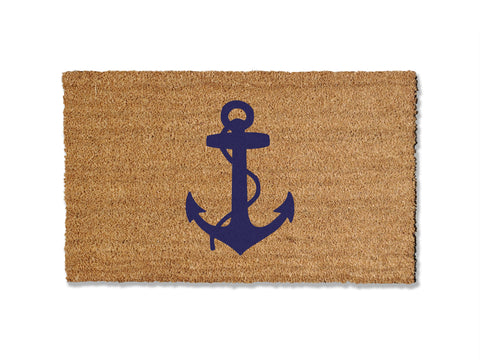 A coir doormat that is 18 inches by 30 inches and has a navy anchor printed on it.
