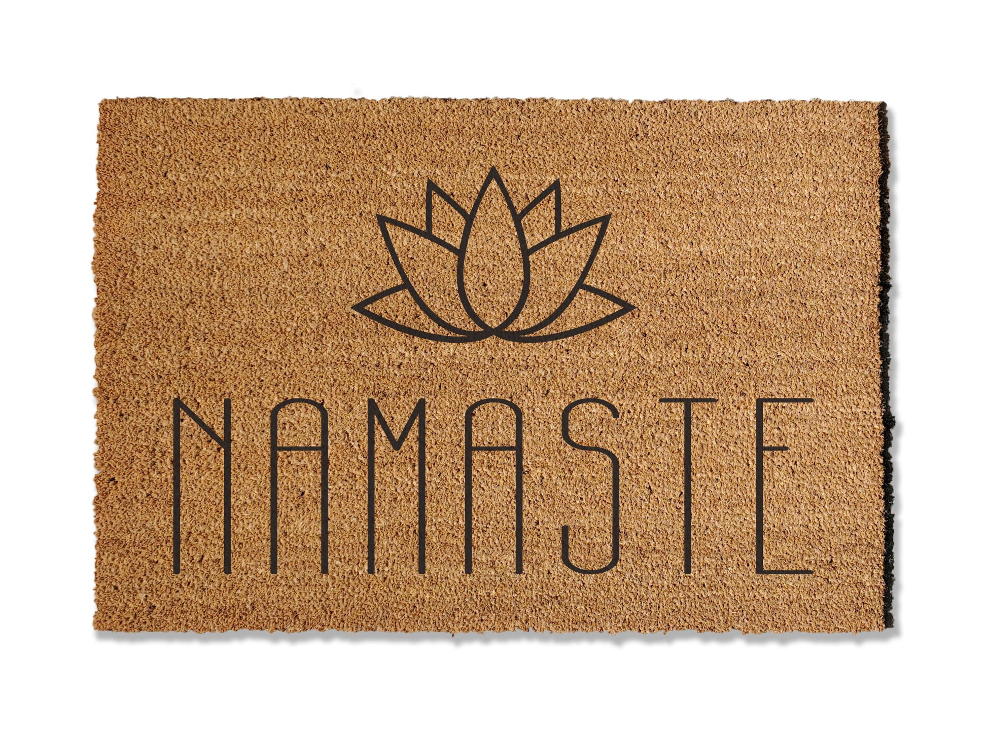 Welcome tranquility to your entrance with our coir doormat featuring the word 'Namaste' and a serene lotus flower. Ideal for yoga enthusiasts, this mat adds a peaceful touch to your entryway. Available in multiple sizes, it seamlessly combines style and functionality by effectively trapping dirt and enhancing your home with calming vibes.