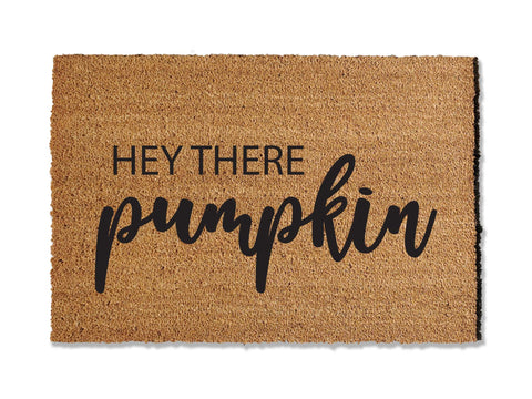 Welcome the fall season with our festive doormat, adorned with the cheerful message 'Hey There Pumpkin.' The perfect addition to your entryway, this seasonal mat is sure to bring a smile to guests' faces, adding a touch of autumn charm to your home.