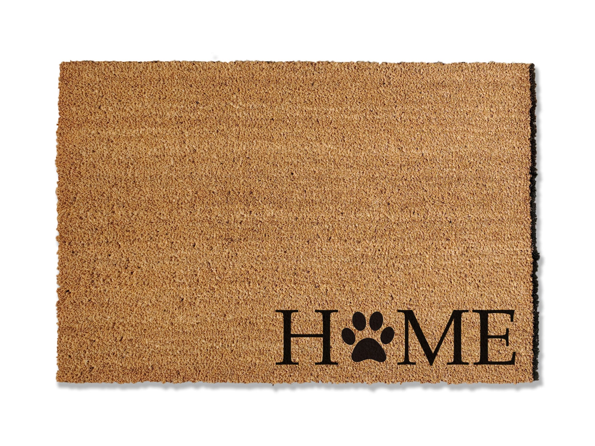 Transform your entryway with our charming coir doormat, featuring the word 'Home' with a paw print replacing the 'o' in the bottom right corner. Perfect for welcoming guests to your dog-friendly home, this unique mat not only adds a personal touch but also helps keep dirt at bay, ensuring a clean and inviting space.