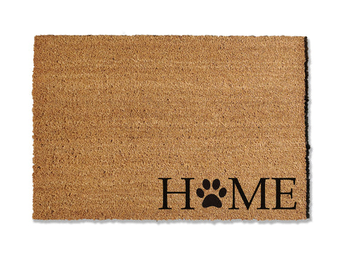 Transform your entryway with our charming coir doormat, featuring the word 'Home' with a paw print replacing the 'o' in the bottom right corner. Perfect for welcoming guests to your dog-friendly home, this unique mat not only adds a personal touch but also helps keep dirt at bay, ensuring a clean and inviting space.