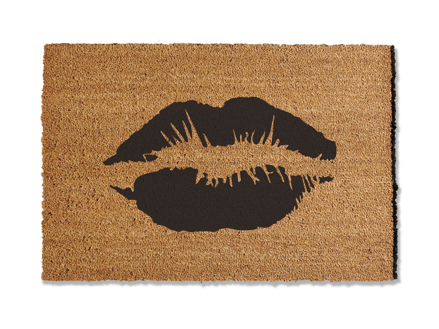 Make a chic statement with our coir doormat featuring a playful lipstick smooch. Available in multiple colors and sizes, this trendy mat adds a touch of glamour to your doorstep. Beyond style, it excels at trapping dirt, making it a functional and fashionable addition to your entryway.