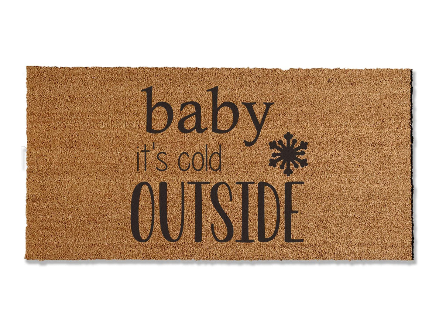 A coir doormat that is 24 inches by 48 inches and has a the text baby it's cold outside with a snowflake painted on it.