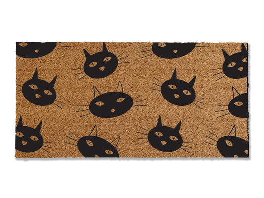 Custom 1/2 inch thick coir doormat featuring a charming cat face pattern. Elevate your entryway with this personalized mat that not only adds a touch of feline charm but is also highly effective at trapping dirt, ensuring a clean and inviting home.