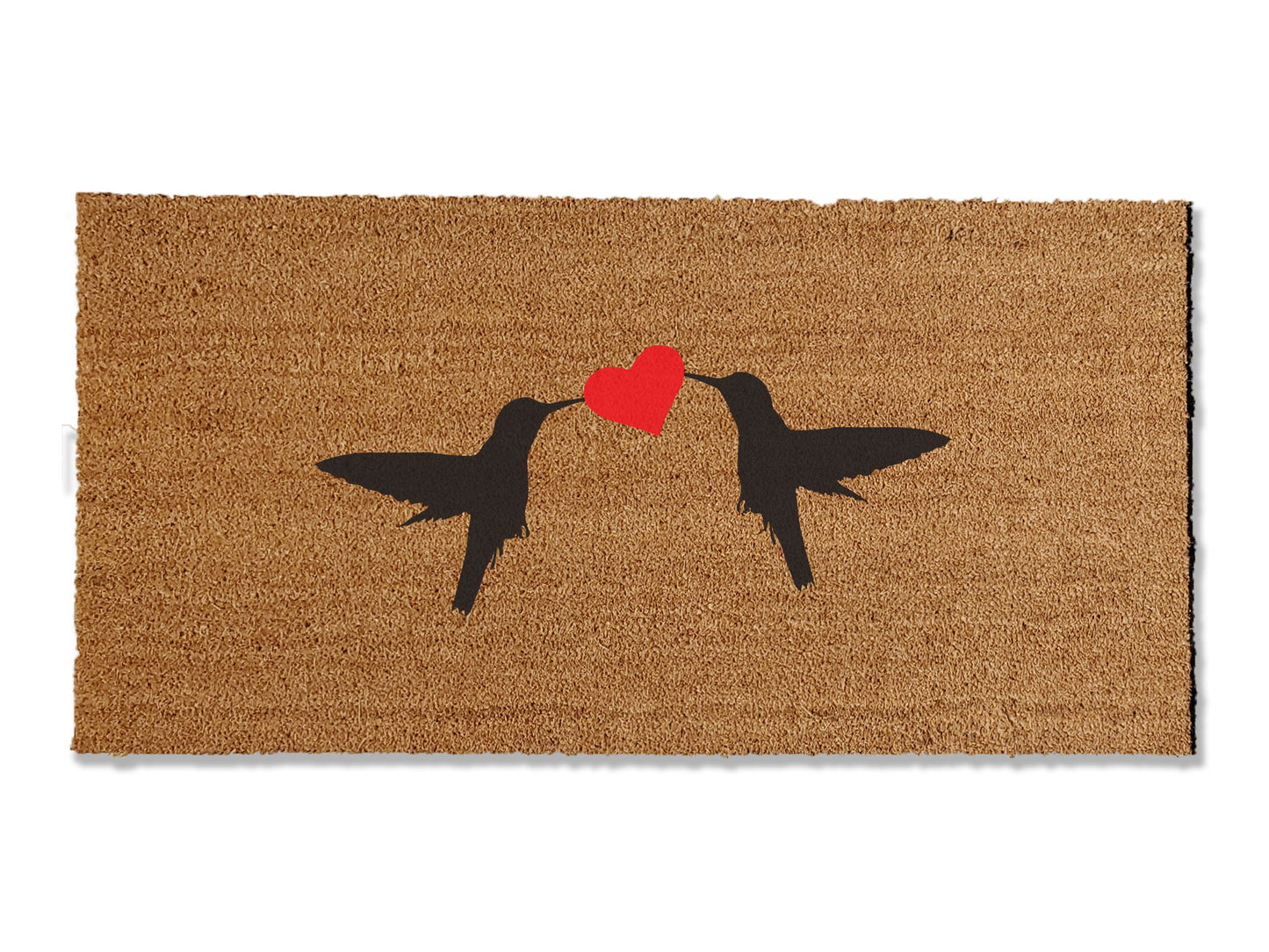 Enhance your entryway with our 1/2-inch thick coir doormat adorned with two hummingbirds and a heart in the middle. Available in multiple sizes, this charming mat not only adds a touch of nature to your doorstep but is also highly effective at trapping dirt. 