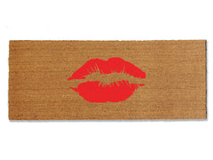 Make a chic statement with our coir doormat featuring a playful lipstick smooch. Available in multiple colors and sizes, this trendy mat adds a touch of glamour to your doorstep. Beyond style, it excels at trapping dirt, making it a functional and fashionable addition to your entryway.
